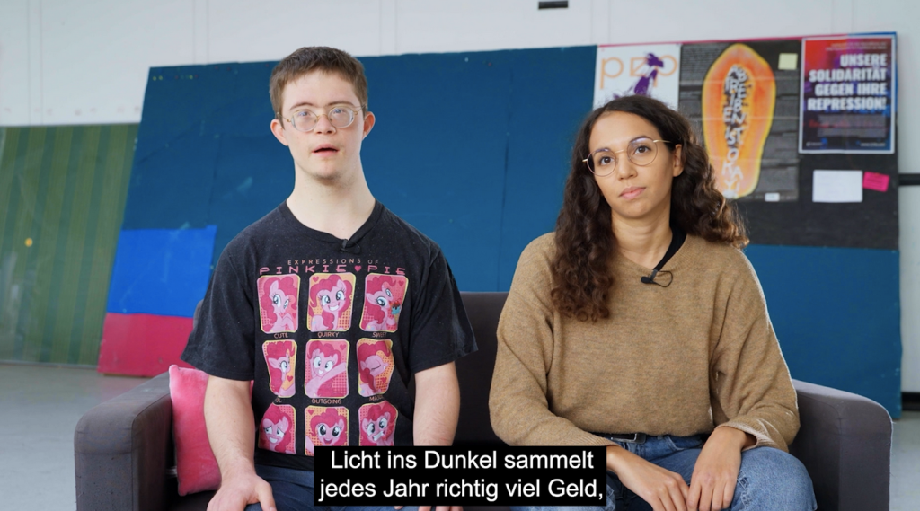 Bild von den Moderator*innen aus der Doku: Das Spenden-Problem. ModeratorInnen Sandra und Fabian